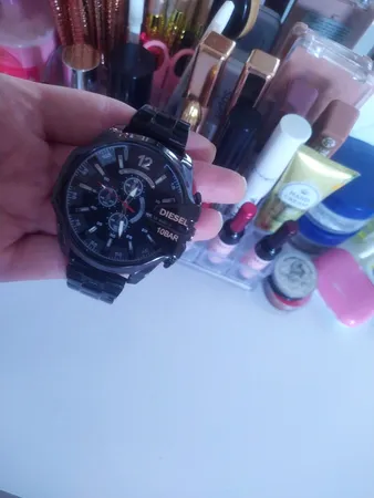 ساعت مچی عقربه‌ای مردانه مدل شاخدار کد 25DSL