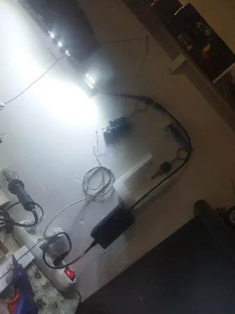 آداپتور 12 ولت 2 آمپر دی ای پی مدل dk1203_shenzhen