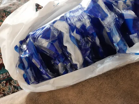 حوله یکبار مصرف پاکیزان مدل AB سایز 80x40 سانتی متر بسته 100 عددی