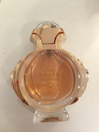 عطر جیبی زنانه نیچ برند کالکشن مدل Olympea حجم 25 میلی لیتر