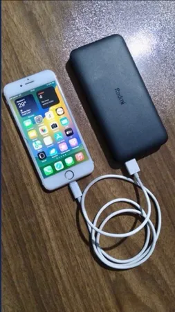 پاوربانک 10 وات شیائومی مدل Redmi ظرفیت 10000 میلی آمپر ساعت به همراه کابل تبدیل microUSB