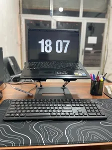 تجریه خرید پایه نگهدارنده لپ تاپ تنظیم پذیر مدل B05