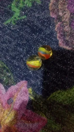 تیله شیشه ای مداد چوبی مدل چند رنگ بسته 100 عددی