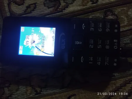 گوشی موبایل جی ال ایکس مدل iT5606 دو سیم کارت ظرفیت 32 مگابایت و رم 32 مگابایت