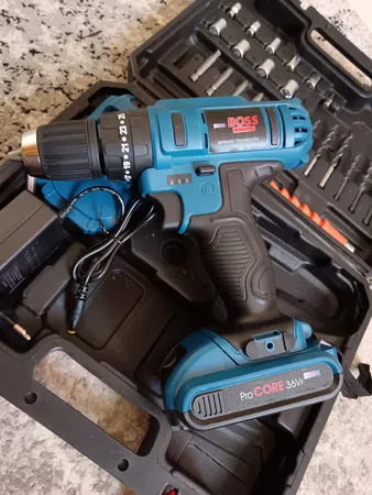 دریل شارژی چکشی باس مدل SK-6050 مجموعه 28 عددی