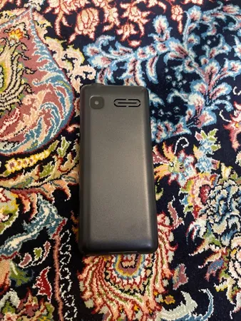 گوشی موبایل جی ال ایکس مدل iT5606 دو سیم کارت ظرفیت 32 مگابایت و رم 32 مگابایت