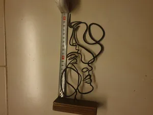 تجریه خرید تندیس نیتا متال طرح دو چهره