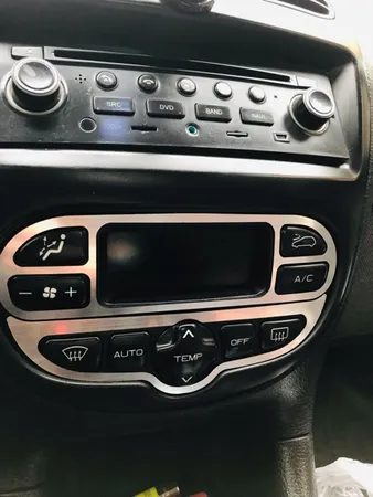 قاب دور پنل تهویه کولر مدل AC5 مناسب برای پژو 206 تیپ 5