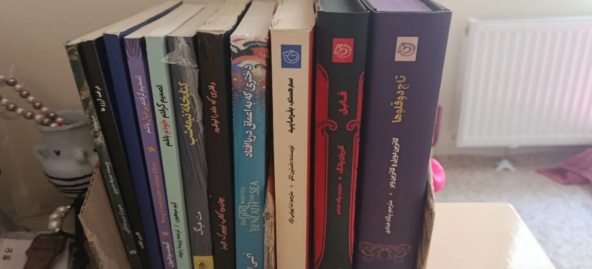 کتاب دختری که در اعماق دریا افتاد اثر آکسی اوه انتشارات آیین محمود