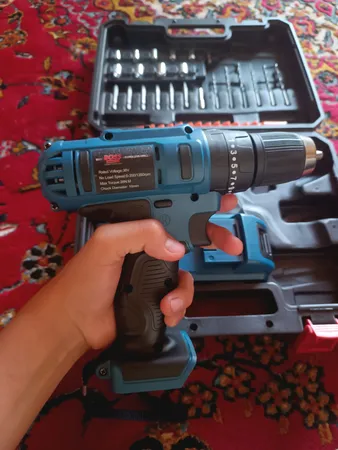 دریل شارژی چکشی باس مدل SK-6050 مجموعه 28 عددی