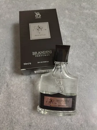 عطر جیبی مردانه برندینی مدل Aventus حجم 33 میلی لیتر