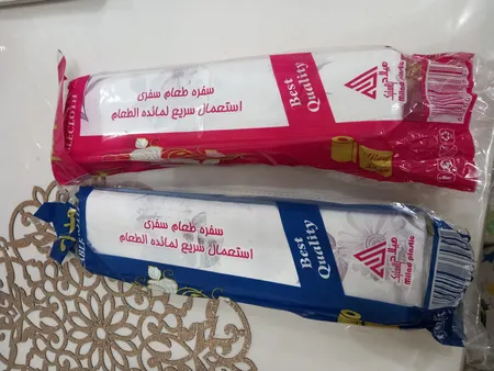 سفره یکبار مصرف طرح گل دار رول 50 متری مجموعه 2 عددی