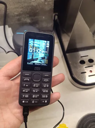 گوشی موبایل تی سی اچ مدل ARC دو سیم‌کارت ظرفیت 4 مگابایت