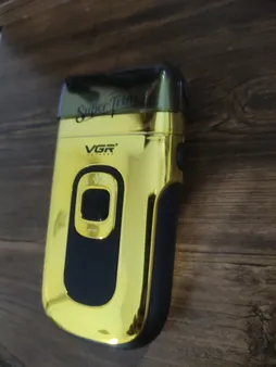 ماشین اصلاح موی صورت وی جی ار مدل V_332، اصلاح به صورت فویلی، صفر زن، منبع انرژی باتری قابل شارژ، تکنولوژی اصلاح به صورت برش چرخشی، به همراه برس تمیزکننده، جنس تیغه از استیل ضد زنگ