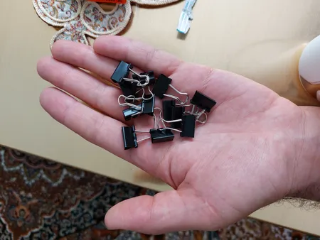 گیره کاغذ دینگ لی مدل DL.0006 سایز 15 میلی متر بسته 12 عددی