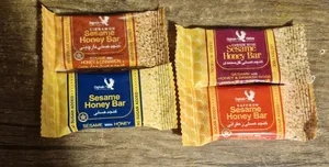 تجریه خرید کنجد عسلی پذیرایی عقاب 10 گرم بسته 32 عددی