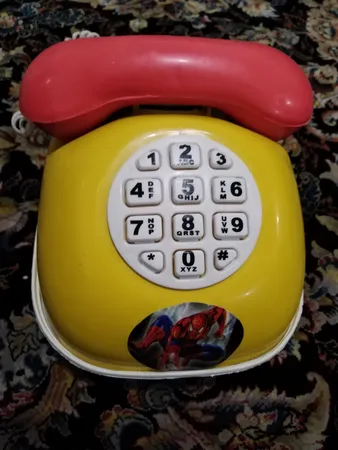 قلک طرح اسباب بازی تلفن و ماشین