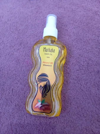 روغن مو ضد ریزش و تقویت کننده مرحبا مدل Almond Oil حجم 175 میلی لیتر