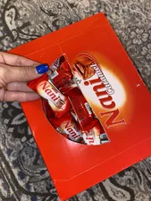 تجریه خرید شکلات مغز دار نانی شیرین عسل -800 گرم بسته 100 عددی