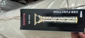 تجریه خرید ماشین اصلاح موی سر و صورت شارژی مدل TJ-6037U، اصلاح به صورت خط زن، قابلیت استفاده به صورت خشک و مرطوب، منبع انرژی با باتری، تکنولوژی اصلاح به صورت برش مستقیم، مدت زمان شارژ 120 دقیقه، تیغه‌های استیل ضد زنگ، به همراه برس تمیزکننده، کابل USB و روغن