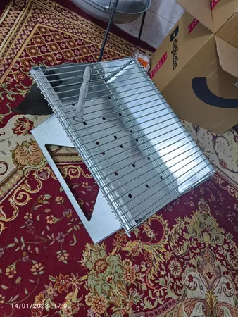 منقل تاشو سفری مدل M7 به همراه هدیه  بادبزن و انبر