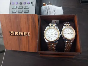 تجریه خرید ست ساعت مچی زنانه و مردانه اسکمی مدل  9098 کد 02