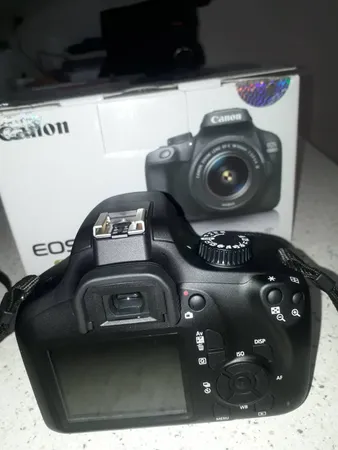 دوربین دیجیتال کانن مدل EOS 2000D به همراه لنز 18-55 میلی متر DC III