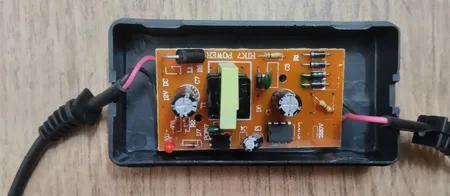 آداپتور 12 ولت 2 آمپر دی ای پی مدل dk1203_shenzhen