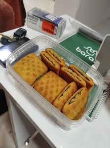 تجریه خرید شیرینی کلمپه خرمایی برنجی بازار دهکده - 650 گرم