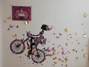 تجریه خرید استیکر دیواری ژیوار طرح دختر دوچرخه سوار