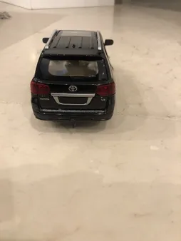 ماشین بازی چه ژی مدل فلزی 6 درب بازشو تویوتا دودزا