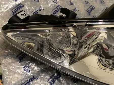 چراغ جلو چپ کروز پلاس مدل CR50060501 مناسب برای پژو 206