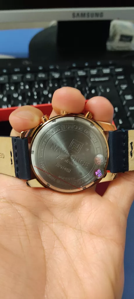 ساعت مچی عقربه ای مردانه نیوی فورس مدل NF9148M / SO -TA به همراه دستمال مخصوص نانو برند کلیر واچ
