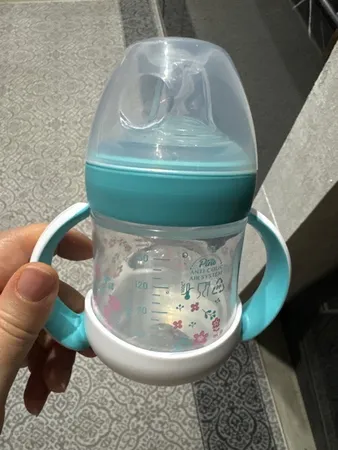 لیوان آموزشی کودک پینو بیبی مدل Natural sense حجم 150 میلی لیتر