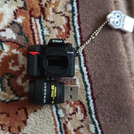 فلش مموری طرح دوربین عکاسی نیکون مدل Ultita -CN01 ظرفیت 32 گیگابایت