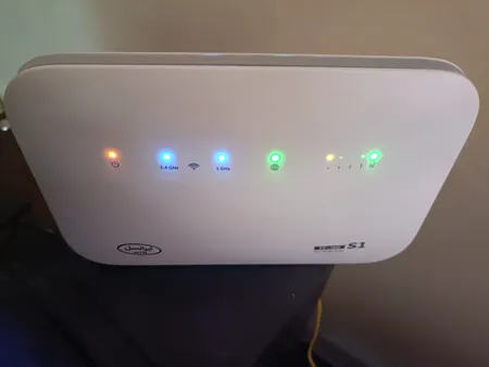 مودم TD-LTE ایرانسل مدل TF-i60 S1 به همراه سیم کارت دو قلو و بسته 50 گیگ یک ماهه