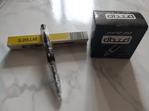 تجریه خرید خودنویس دلار شفاف مدل 717i