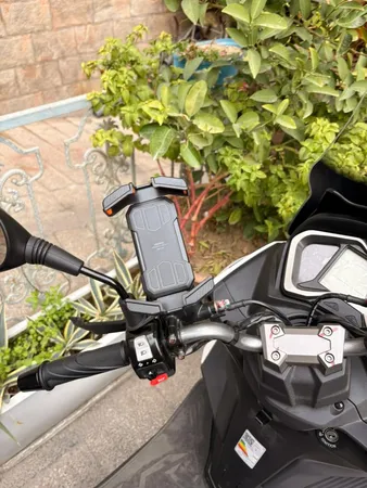 پایه نگهدارنده گوشی موبایل دوچرخه و موتور سیکلت ریمکس مدل RM-C52