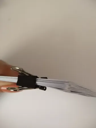 گیره کاغذ دینگ لی مدل DL.0006 سایز 15 میلی متر بسته 12 عددی