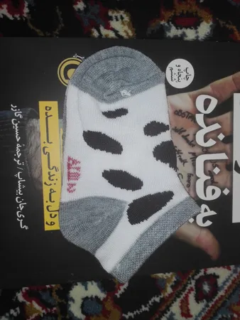 جوراب نوزادی طرح گاو