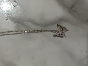 تجریه خرید گردنبند دخترانه مدل پلاک پروانه