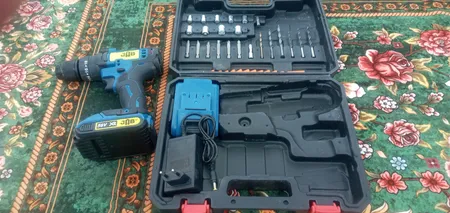 دریل پیچ گوشتی شارژی چکشی جاب مدل JB-5690 B مجموعه 45 عددی
