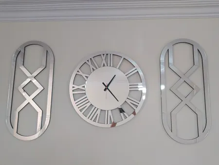 ساعت دیواری اِلِنسی مدل Helios به همراه آینه