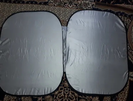 آفتابگیر شیشه خودرو مدل عینکی