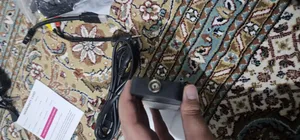 تجریه خرید ویدئو پروژکتور النز مدل SD500 Smart Android به همراه پرده نمایش و دو کنترل