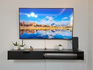 تجریه خرید میز تلویزیون دیواری مدل DLF86L