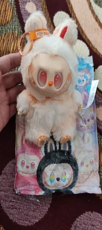 عروسک مدل  ارتفاع 18 سانتی متر