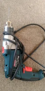 تجریه خرید دریل چکشی 30 میلی‌متری 810 وات رابین مدل R1015