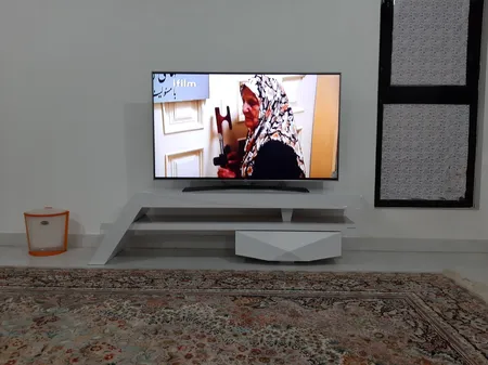 میز تلویزيون راهپود مدل آفتابگردان به همراه طبقه دیواری