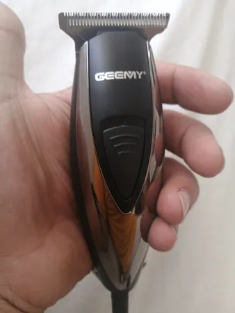ماشین اصلاح موی سر و صورت و بدن جیمی مدل GM-830، اصلاح به صورت خط زن، قابلیت تنظیم سرعت، منبع انرژی با آداپتور برق، تکنولوژی اصلاح به صورت برش مستقیم، اندازه اصلاح 0.2 میلی‌متر، به‌همراه برس تمیزکننده